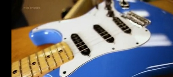 Blue Stratocaster electric guitar.