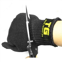 Black glove with knife on it - cut resistant.
