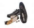 Black shoes, tie, cuff links belonging to character Don Draper sold at Mad Men auction.