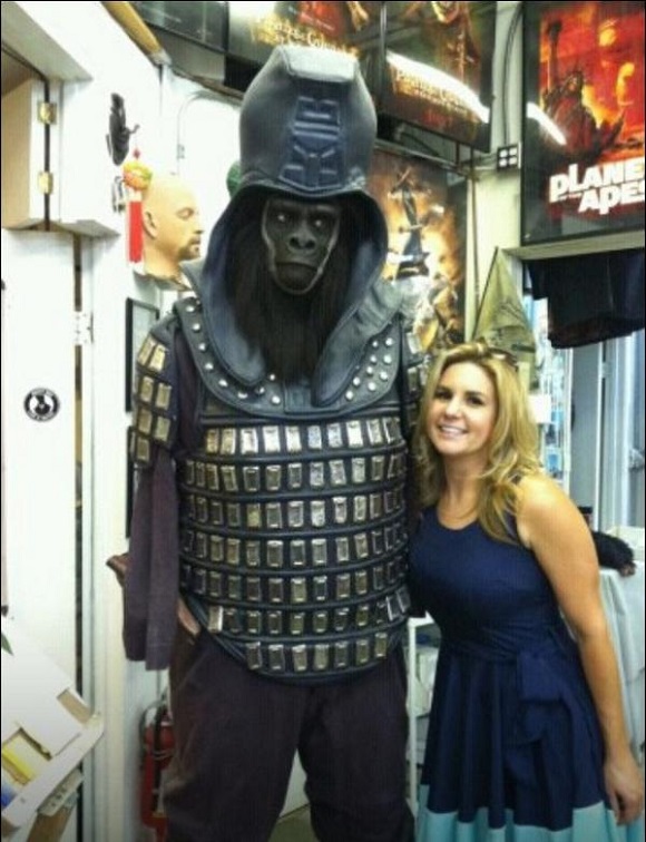 Brandi Passante poses next to Planet of the Apes prop.