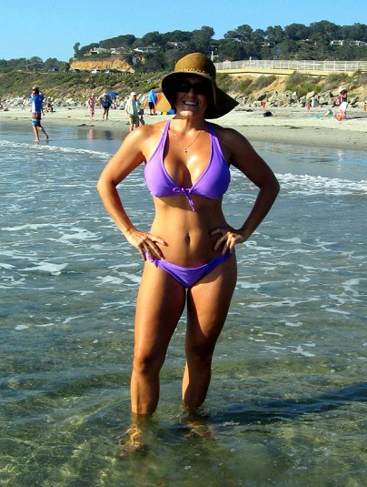 Casey Nezhoda in a bikini at the beach.