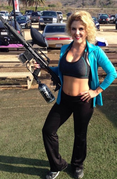 Casey Nezhoda poses with paintball gun.
