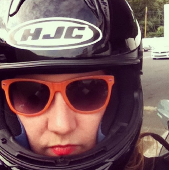Courtney Wagner wears a racing helmet.